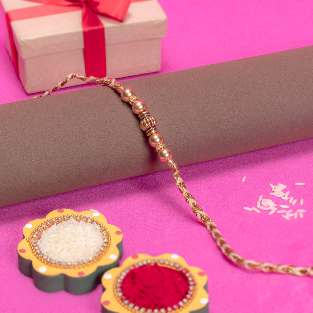 Handmade Rakhi - Golden Glow 
1pc