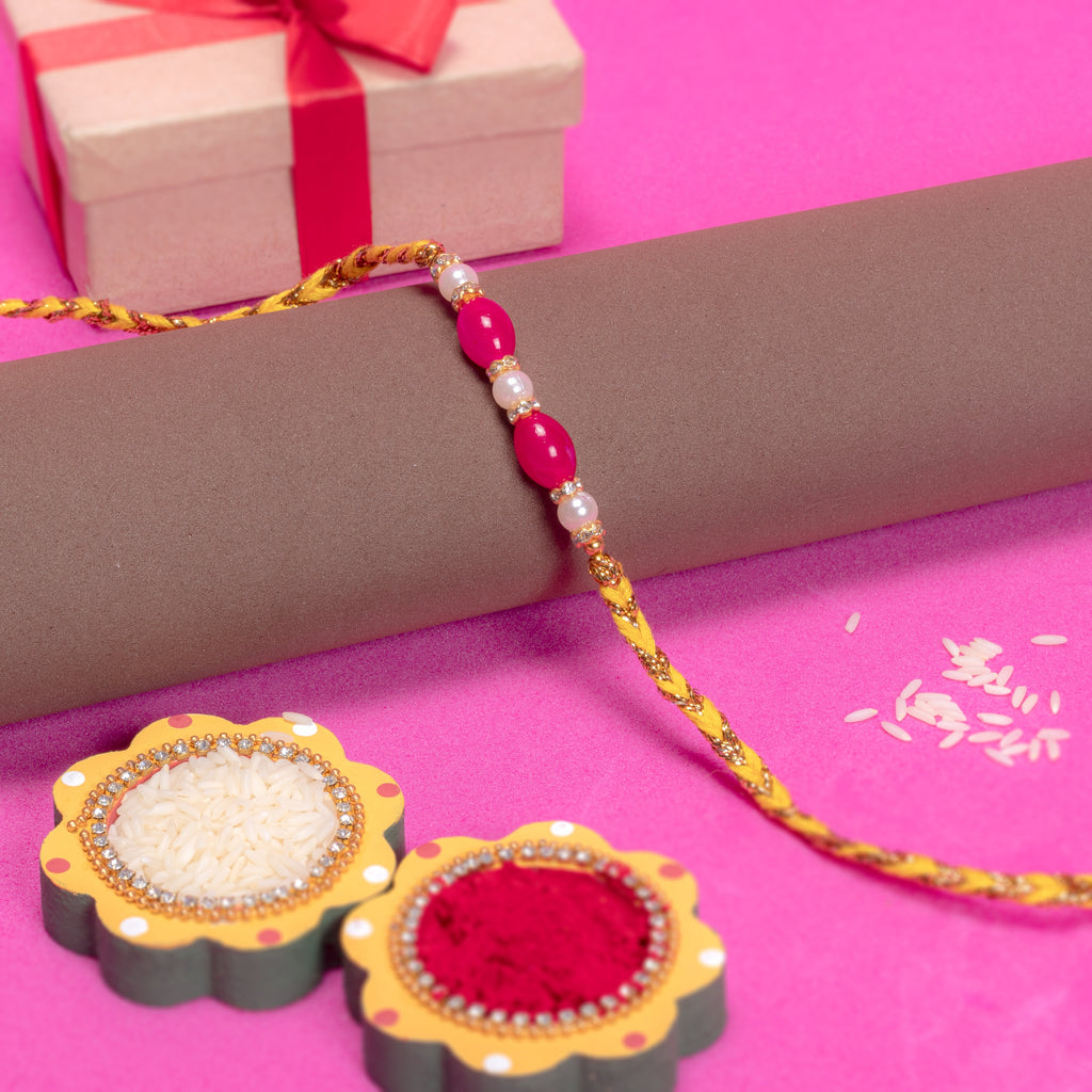 Handmade Rakhi - Ruby Pearl 1pc