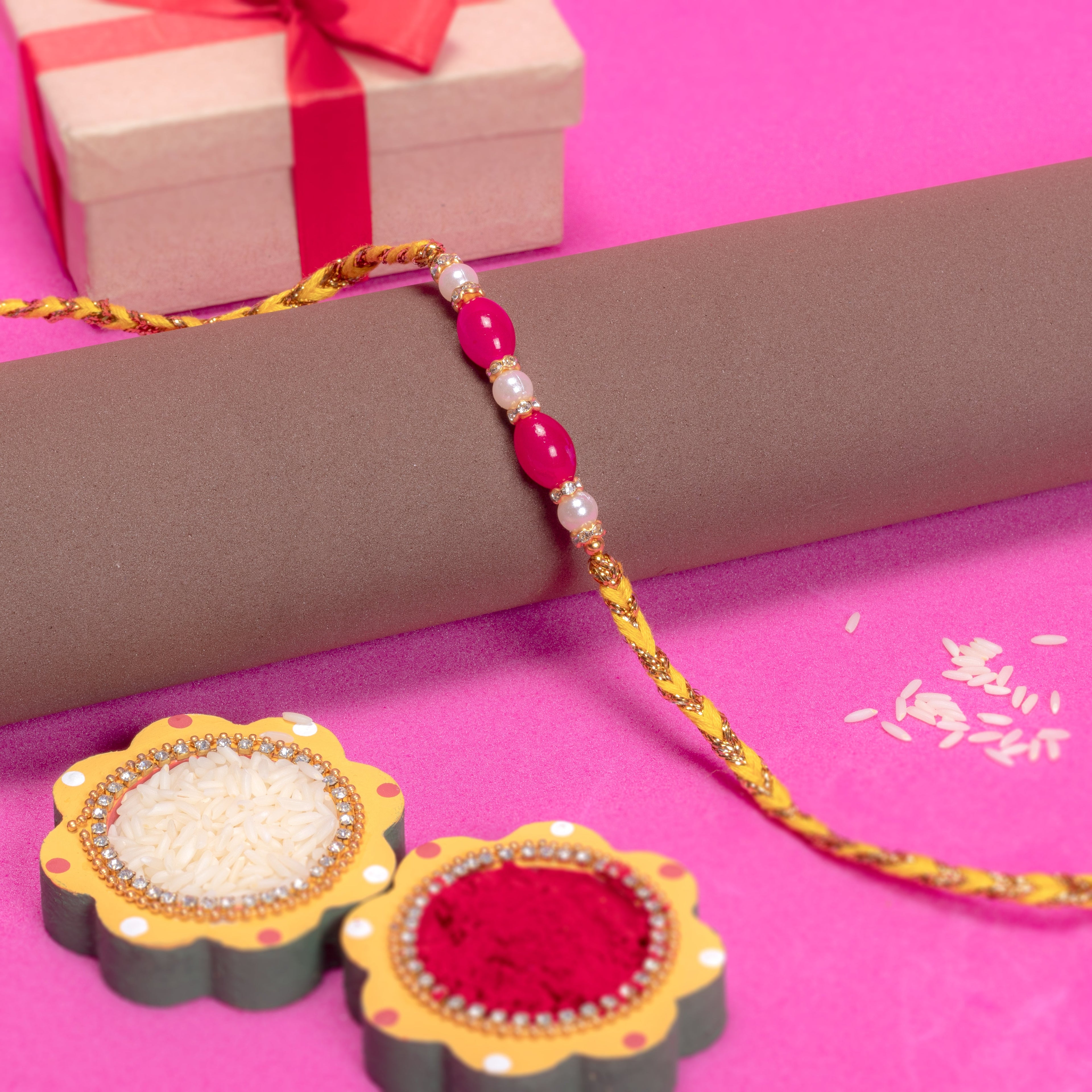 Handmade Rakhi - Ruby Pearl 1pc