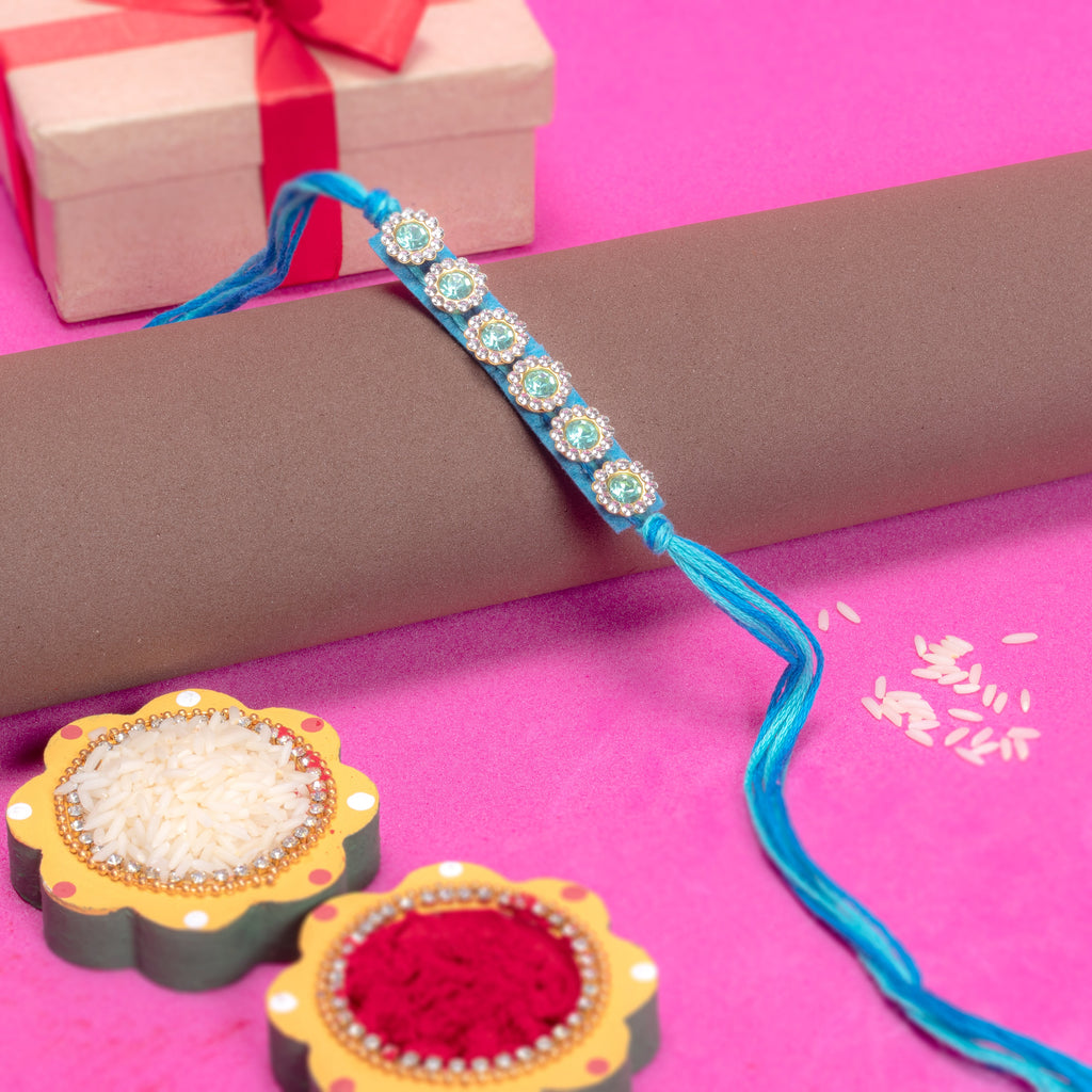 Handmade Rakhi - Turquoise Jewel
1pc