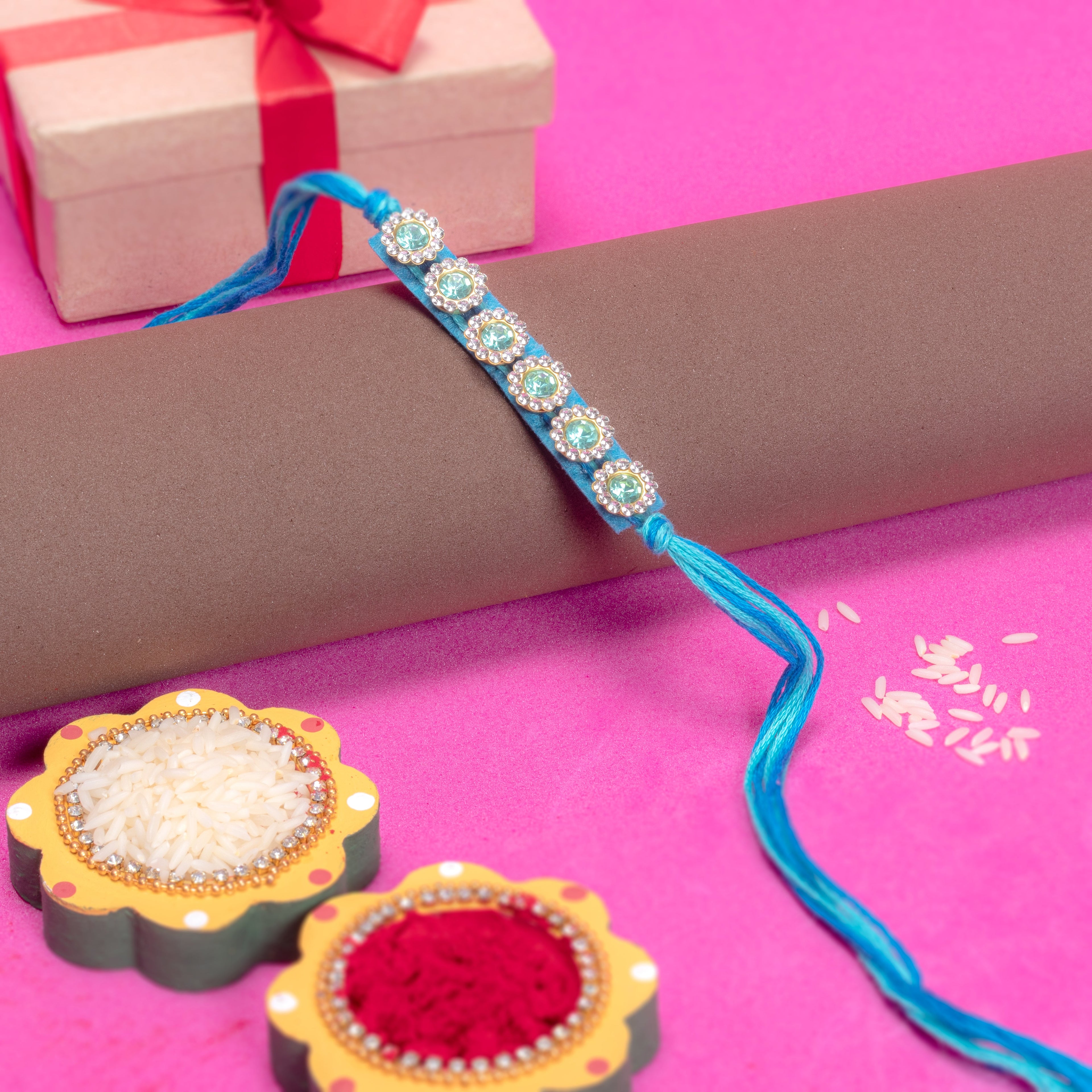 Handmade Rakhi - Turquoise Jewel
1pc