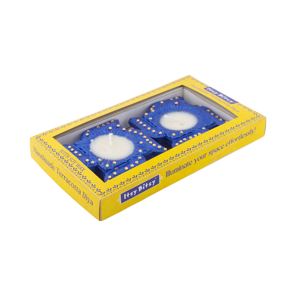 Decorated Terracotta Diya With Wax Swastika Blue 2pc (Wax Filled)
